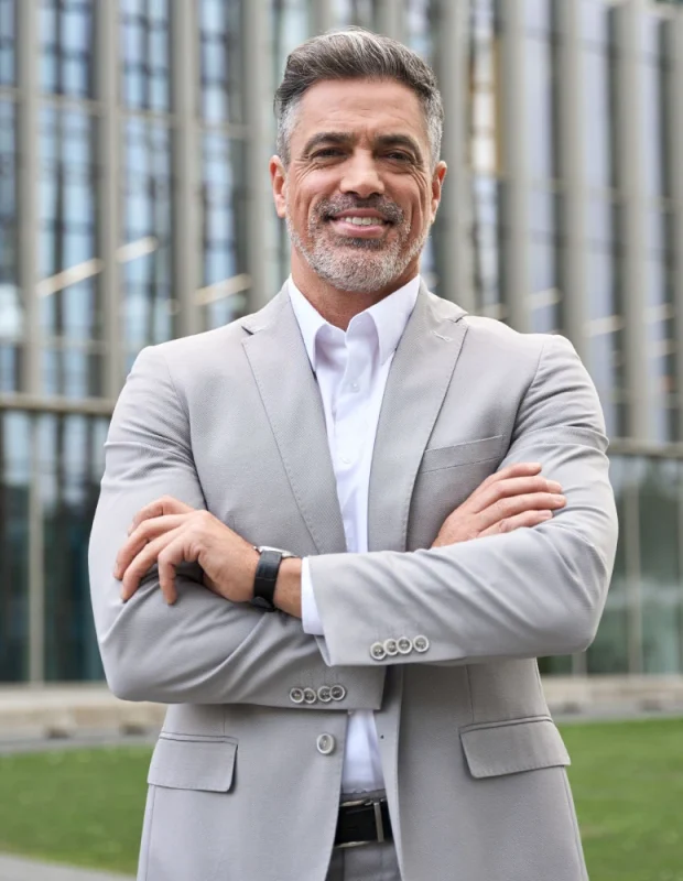 business-man-wearing-suit-standi-2YK6CMZ