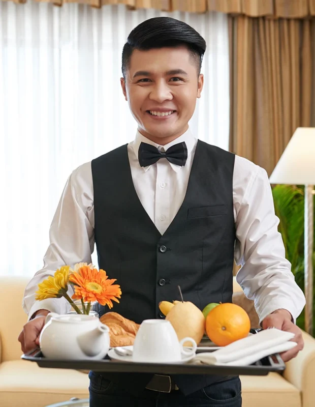 man-serving-breakfast-QNUNCB8