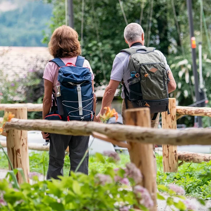 senior-pensioner-couple-hiking-wal-KU2EGH8